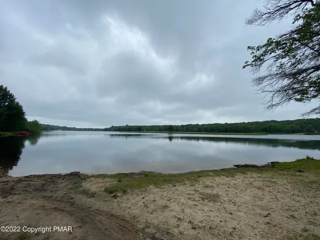 a view of a lake from a yard