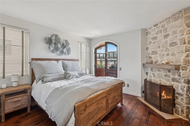 a view of a room with furniture wooden floor and window