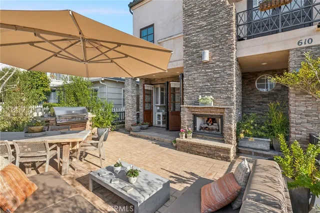 a view of a chair and table in the patio