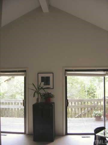 7405 Old Hundred Road Raleigh, NC 27613 - Photo 6 of 10 a view of a livingroom with furniture and a window