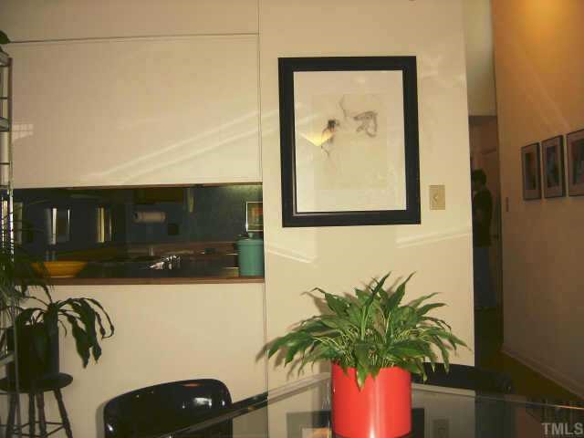 7405 Old Hundred Road Raleigh, NC 27613 - Photo 7 of 10 a vase of flowers sitting on a table