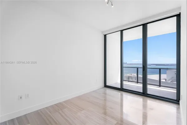 a view of an empty room with window