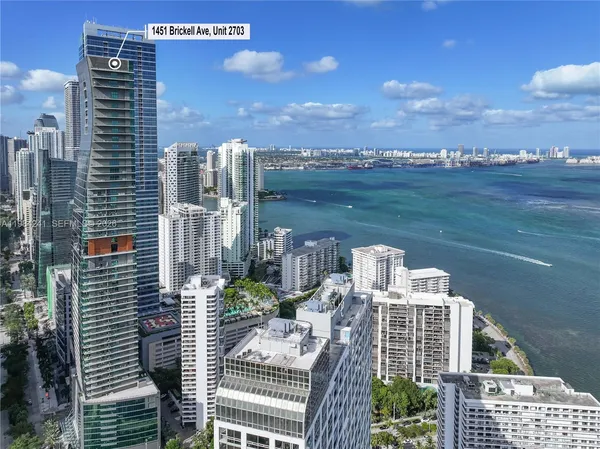 a view of a city with tall buildings