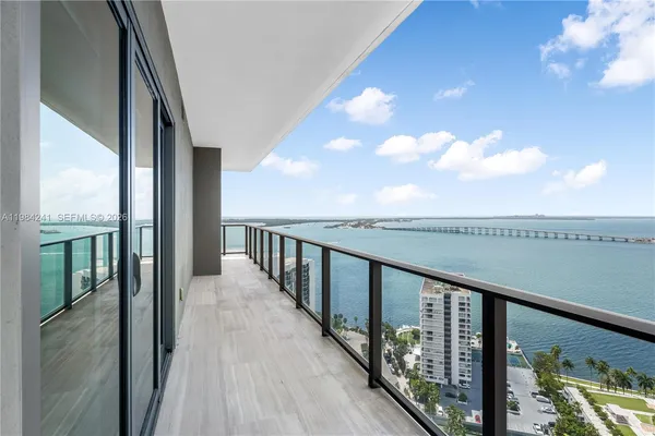 a view of a balcony with an outdoor space