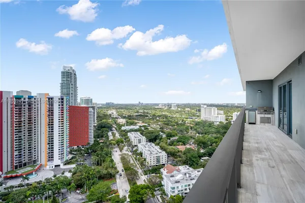 a view of a city with tall buildings