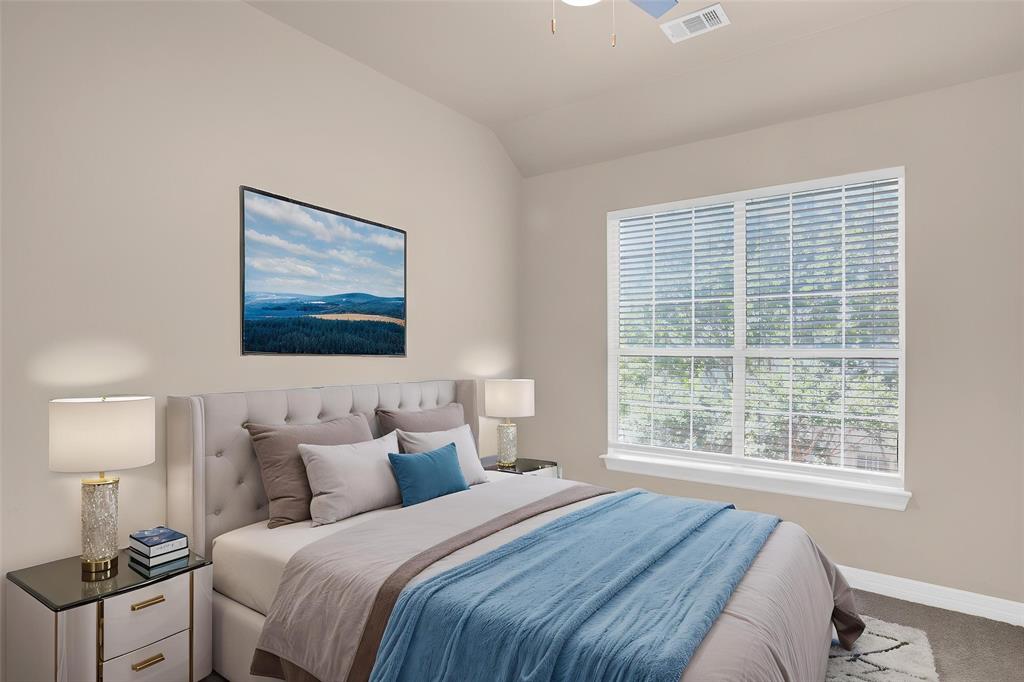 4092 Oberlin Way Addison, TX 75001 - Photo 28 of 40 Carpeted bedroom featuring baseboards and lofted ceiling