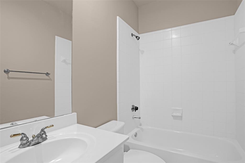4092 Oberlin Way Addison, TX 75001 - Photo 33 of 40 Bathroom featuring toilet, shower / bathtub combination, and vanity