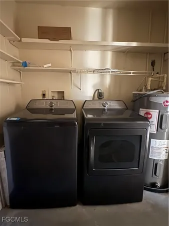 a room with cabinets and a ceiling fan