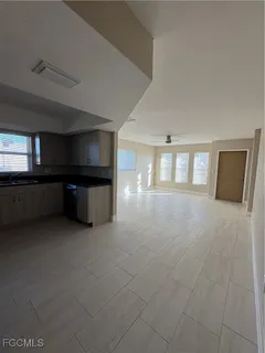 a view of an empty room and window