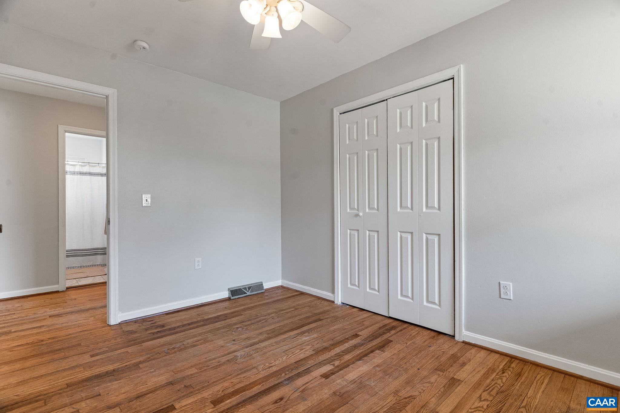 569 Half Mile Branch Road Crozet, VA 22932 - Photo 12 of 35 a view of empty room with wooden floor
