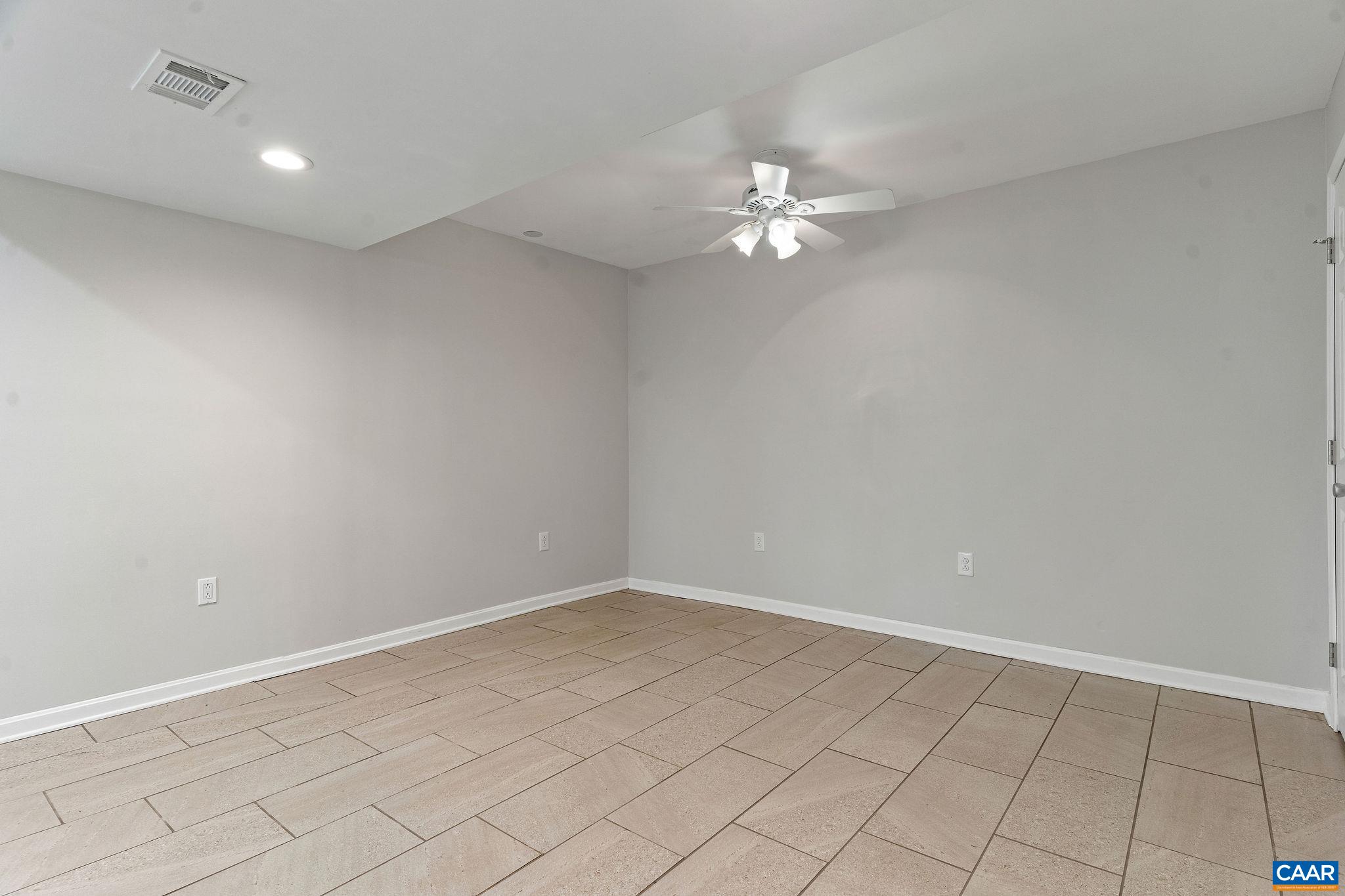 569 Half Mile Branch Road Crozet, VA 22932 - Photo 21 of 35 an empty room with a view of a bathroom