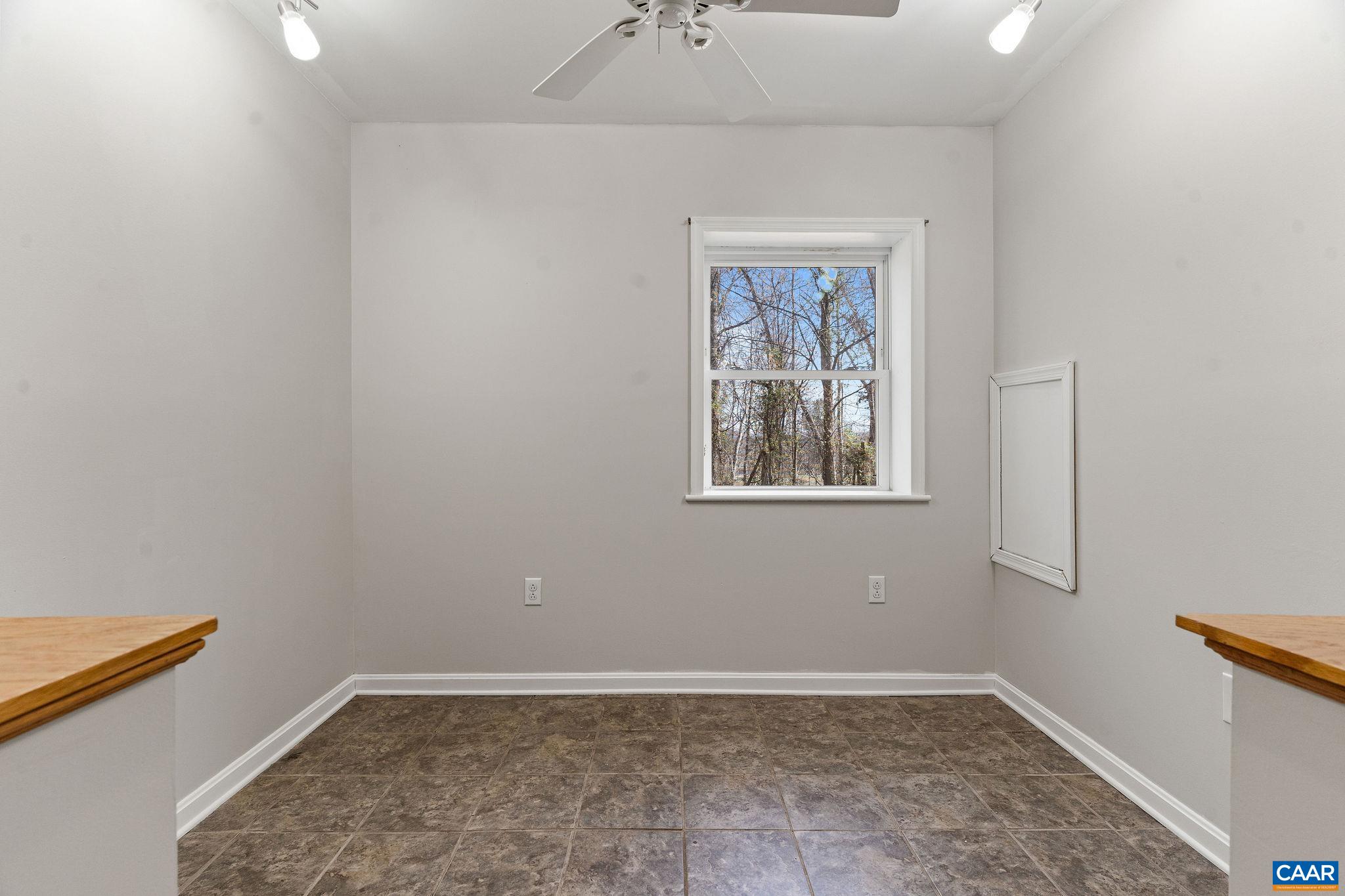 569 Half Mile Branch Road Crozet, VA 22932 - Photo 26 of 35 an empty room with windows