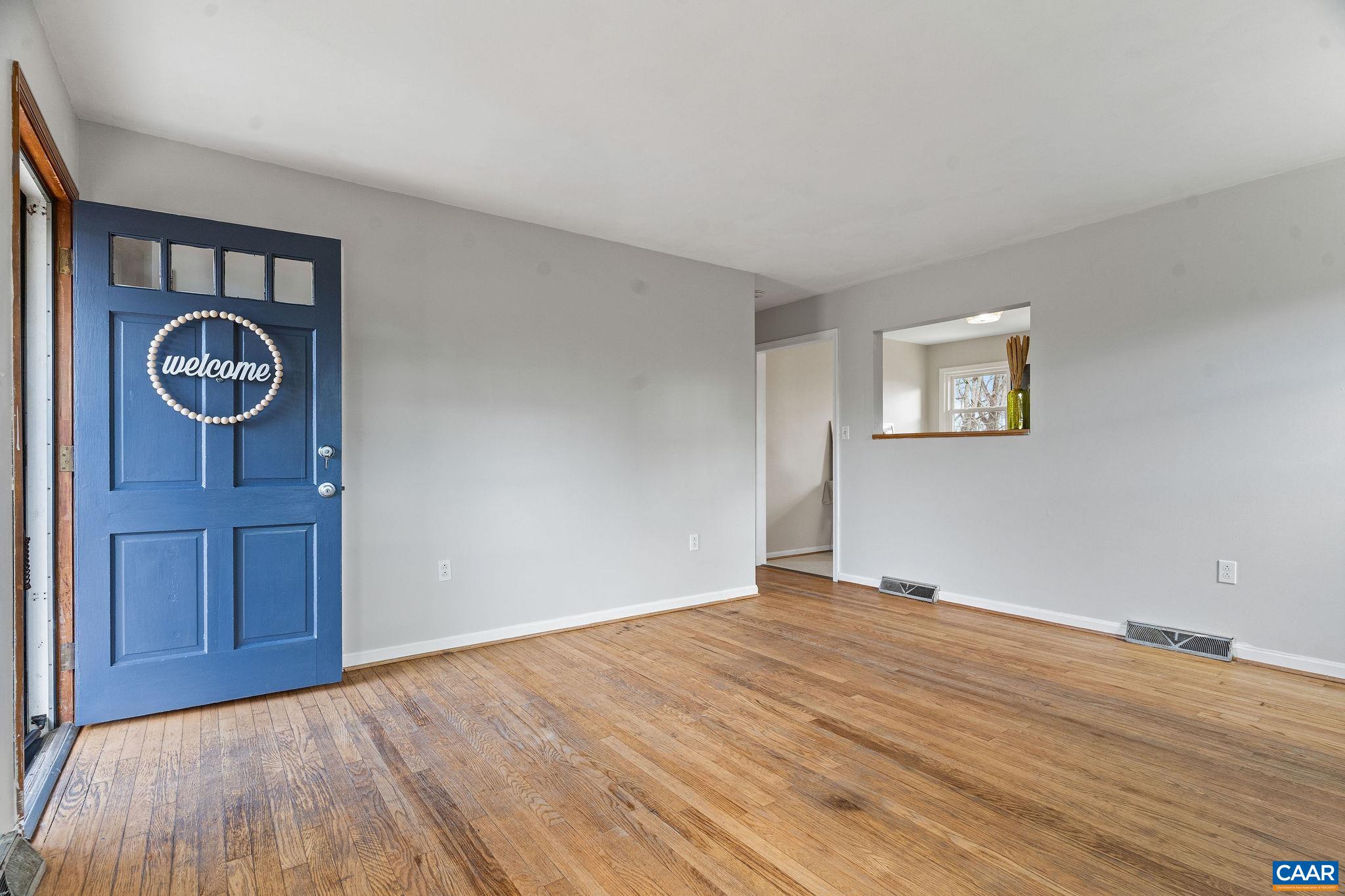 569 Half Mile Branch Road Crozet, VA 22932 - Photo 4 of 35 a view of an empty room with wooden floor