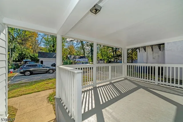 a view of swimming pool from a balcony