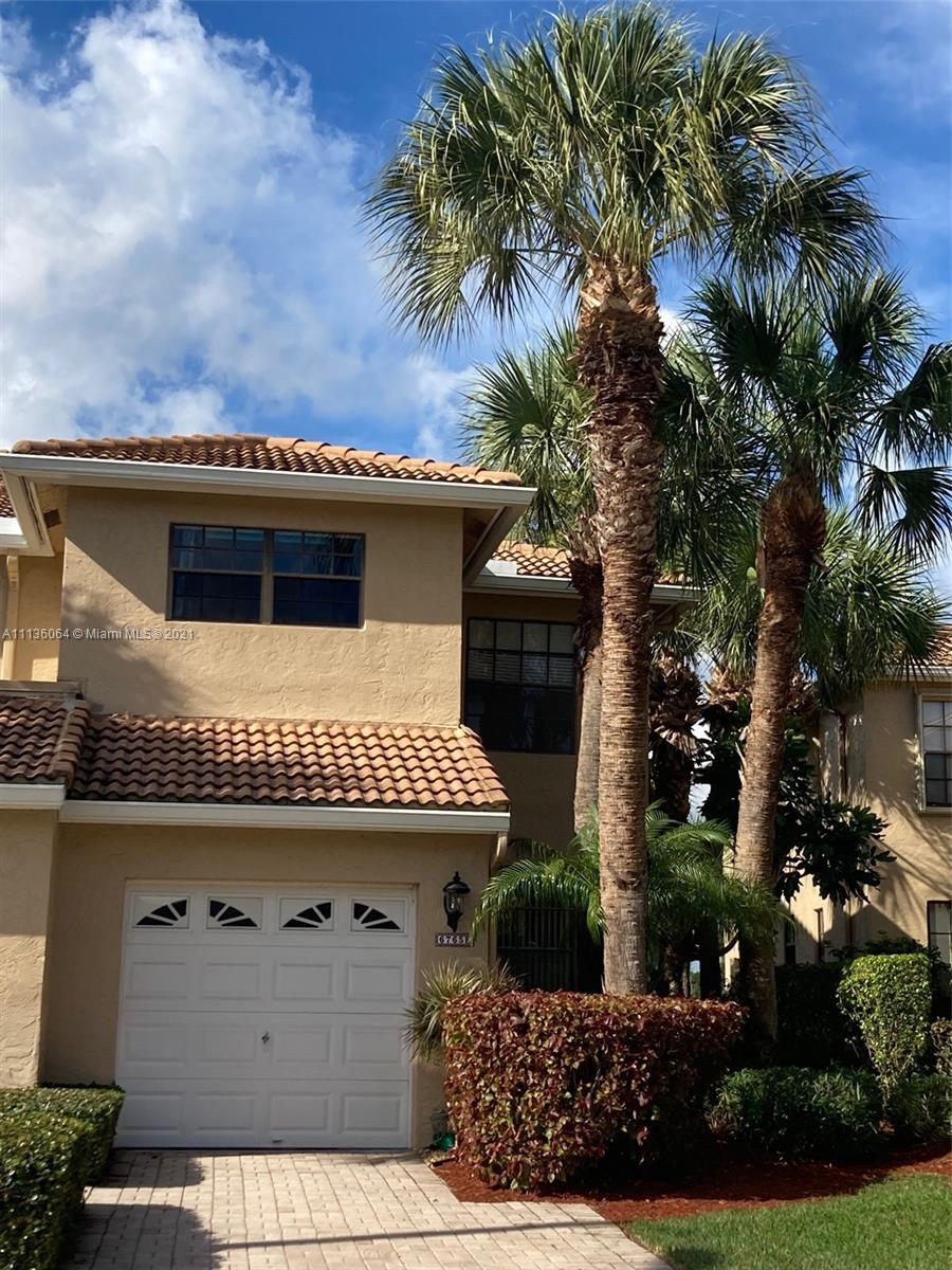 6765 Montego Bay Boulevard, Unit E Boca Raton, FL 33433 - Photo 2 of 31 a view of a house with a tub