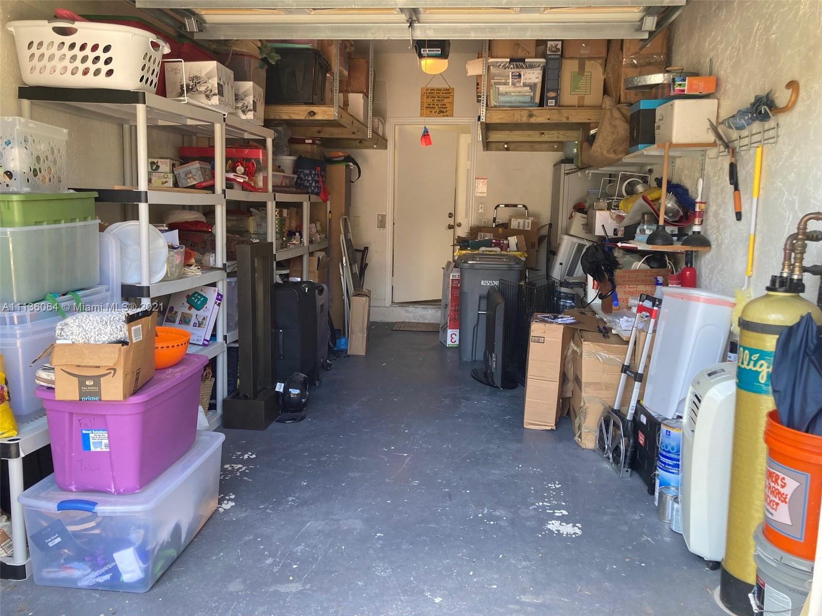 6765 Montego Bay Boulevard, Unit E Boca Raton, FL 33433 - Photo 27 of 31 a view of a storage storage and utility room
