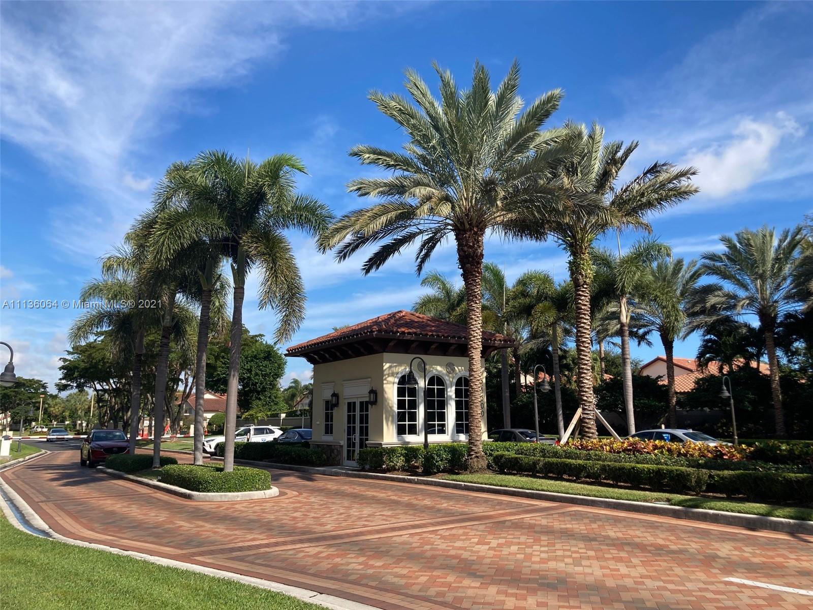 6765 Montego Bay Boulevard, Unit E Boca Raton, FL 33433 - Photo 31 of 31 a view of street along with palm trees