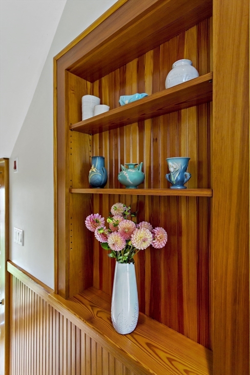 34 Washington Bourne, MA 02532 - Photo 16 of 34 a table with a vase of flowers
