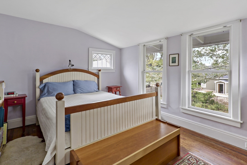 34 Washington Bourne, MA 02532 - Photo 17 of 34 a bedroom with a bed and wooden floor