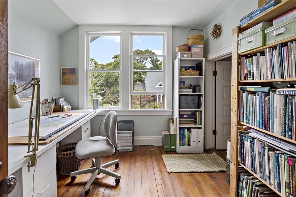 34 Washington Bourne, MA 02532 - Photo 18 of 34 a view of a workspace with furniture and a book shelf