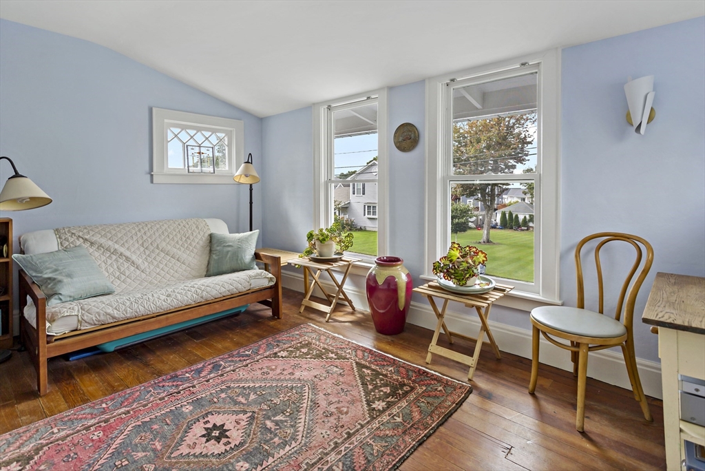 34 Washington Bourne, MA 02532 - Photo 19 of 34 a living room with furniture and a window