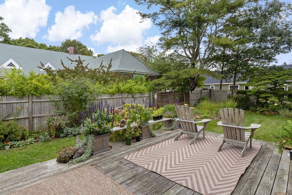 34 Washington Bourne, MA 02532 - Photo 29 of 34 a view of a table and chairs in patio of the house