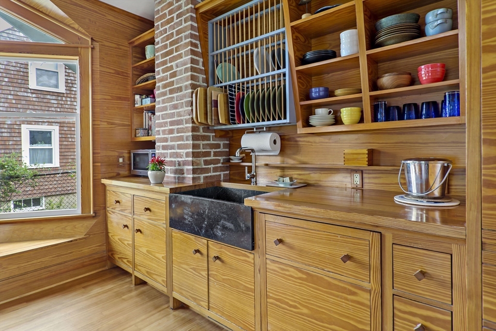 34 Washington Bourne, MA 02532 - Photo 10 of 34 a kitchen with cabinets and window