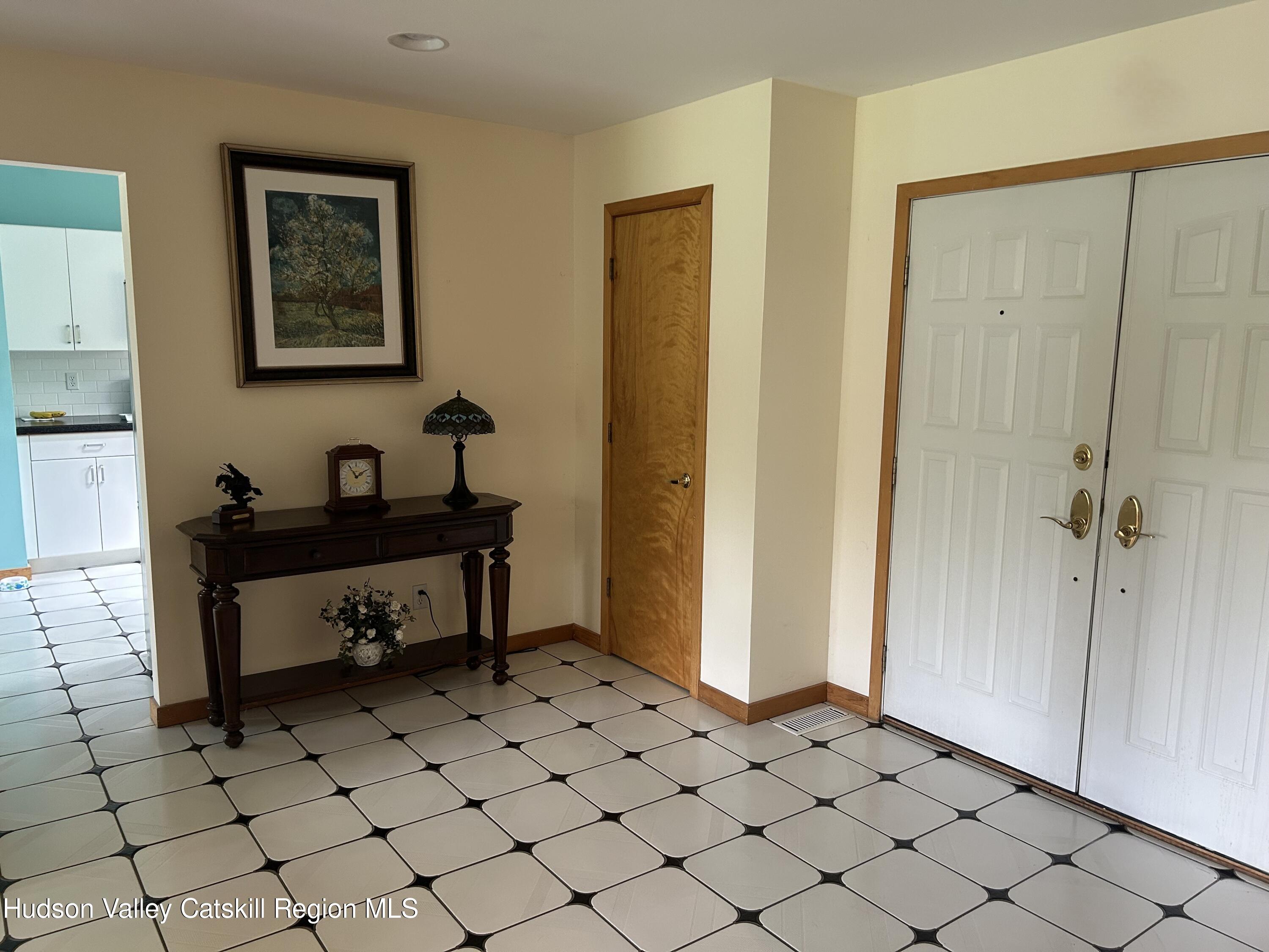 40 Tillson Lake Road Wallkill, NY 12589 - Photo 11 of 42 a view of a workspace with furniture and window