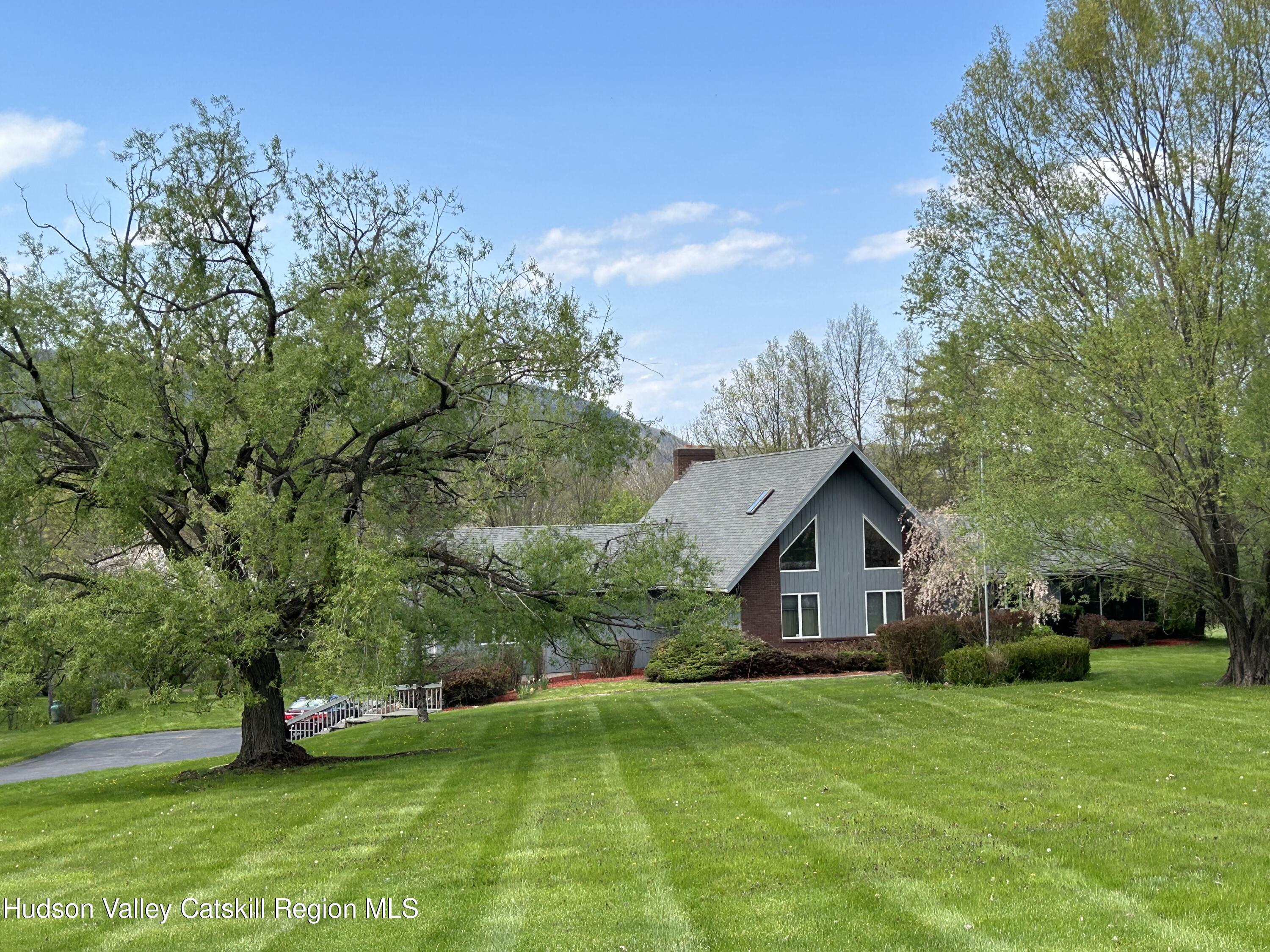 40 Tillson Lake Road Wallkill, NY 12589 - Photo 2 of 42 a front view of house with yard and green space