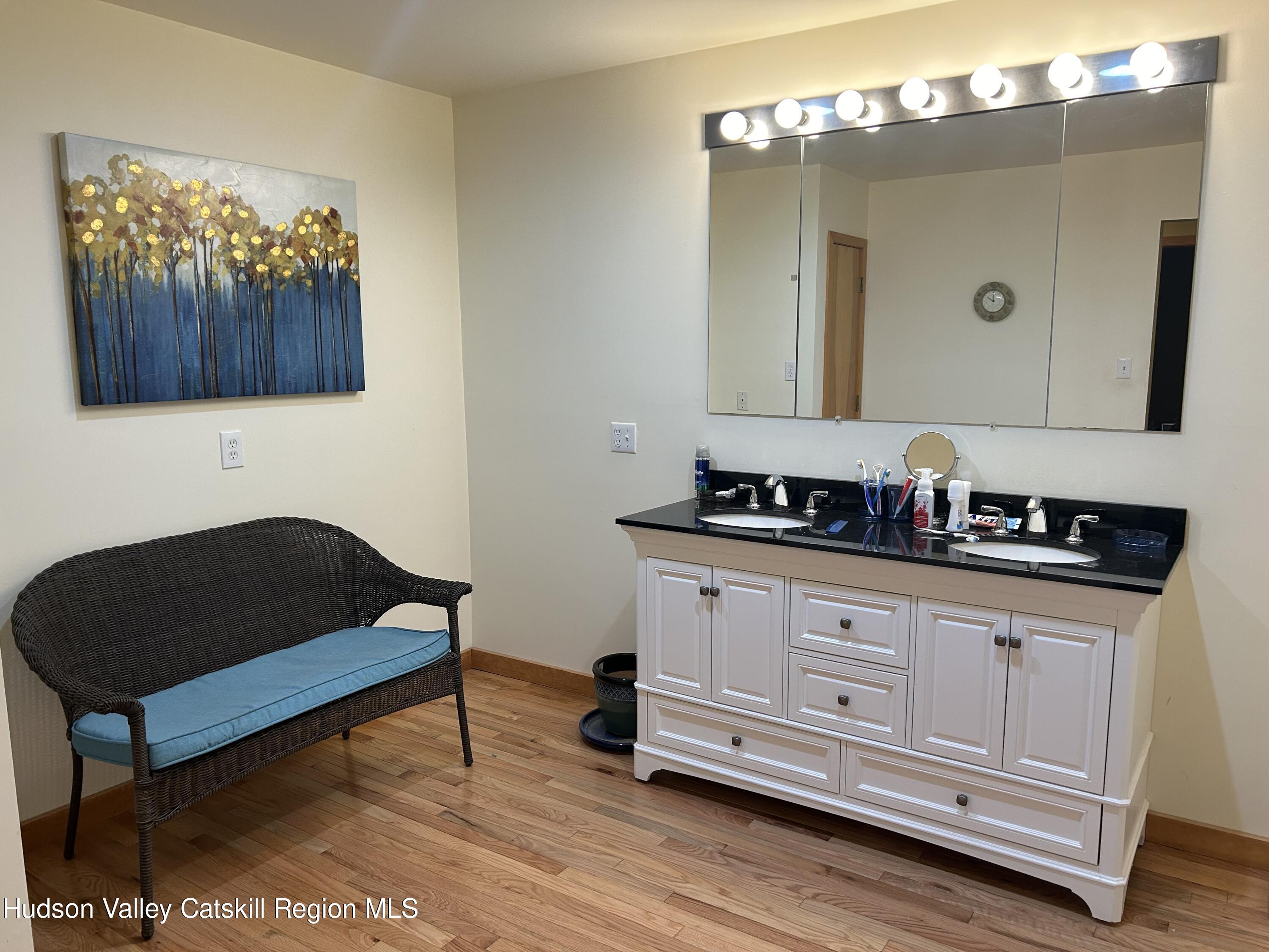 40 Tillson Lake Road Wallkill, NY 12589 - Photo 27 of 42 a bathroom with a sink and a mirror