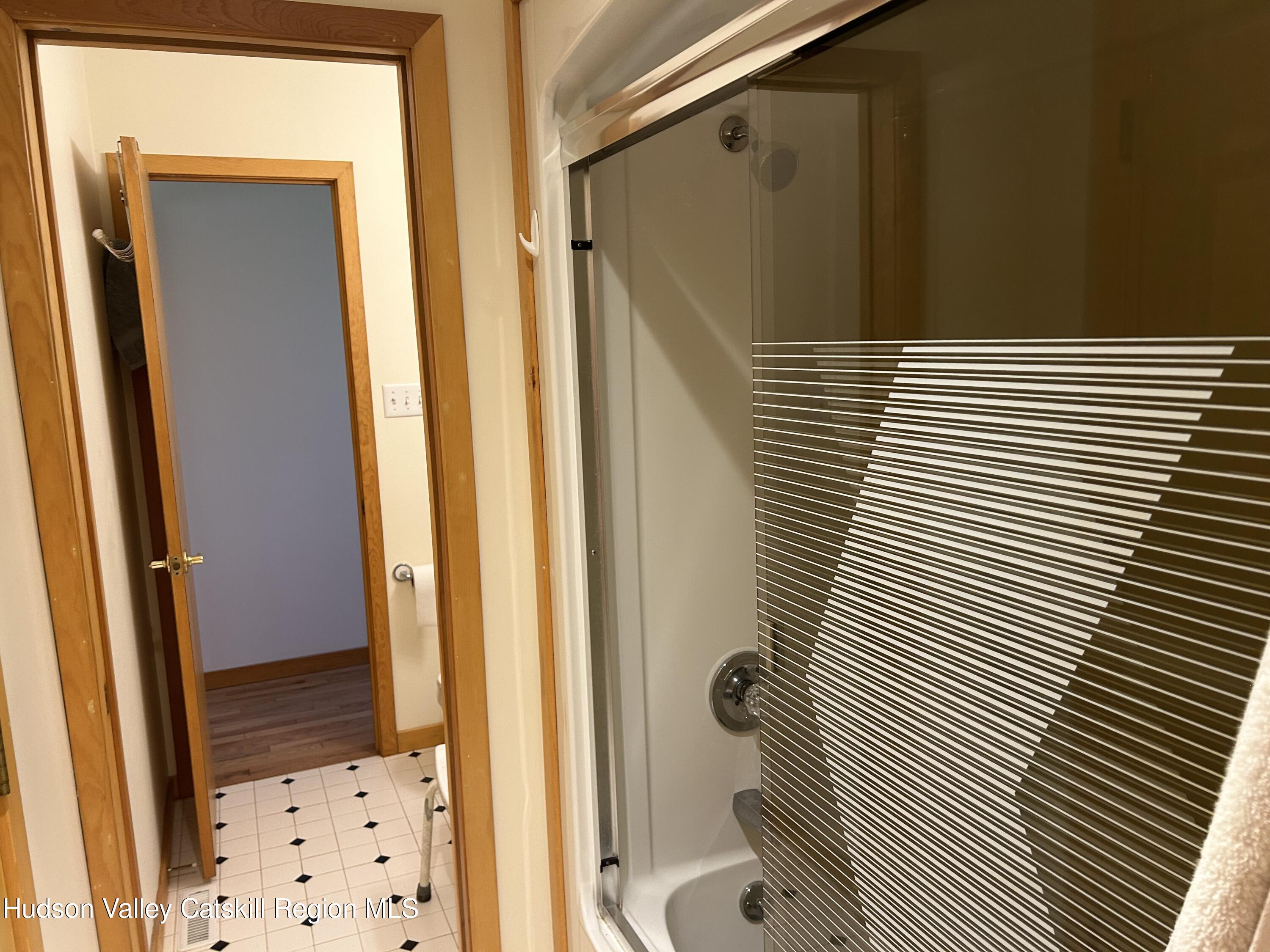 40 Tillson Lake Road Wallkill, NY 12589 - Photo 31 of 42 a bathroom with a shower and a sink