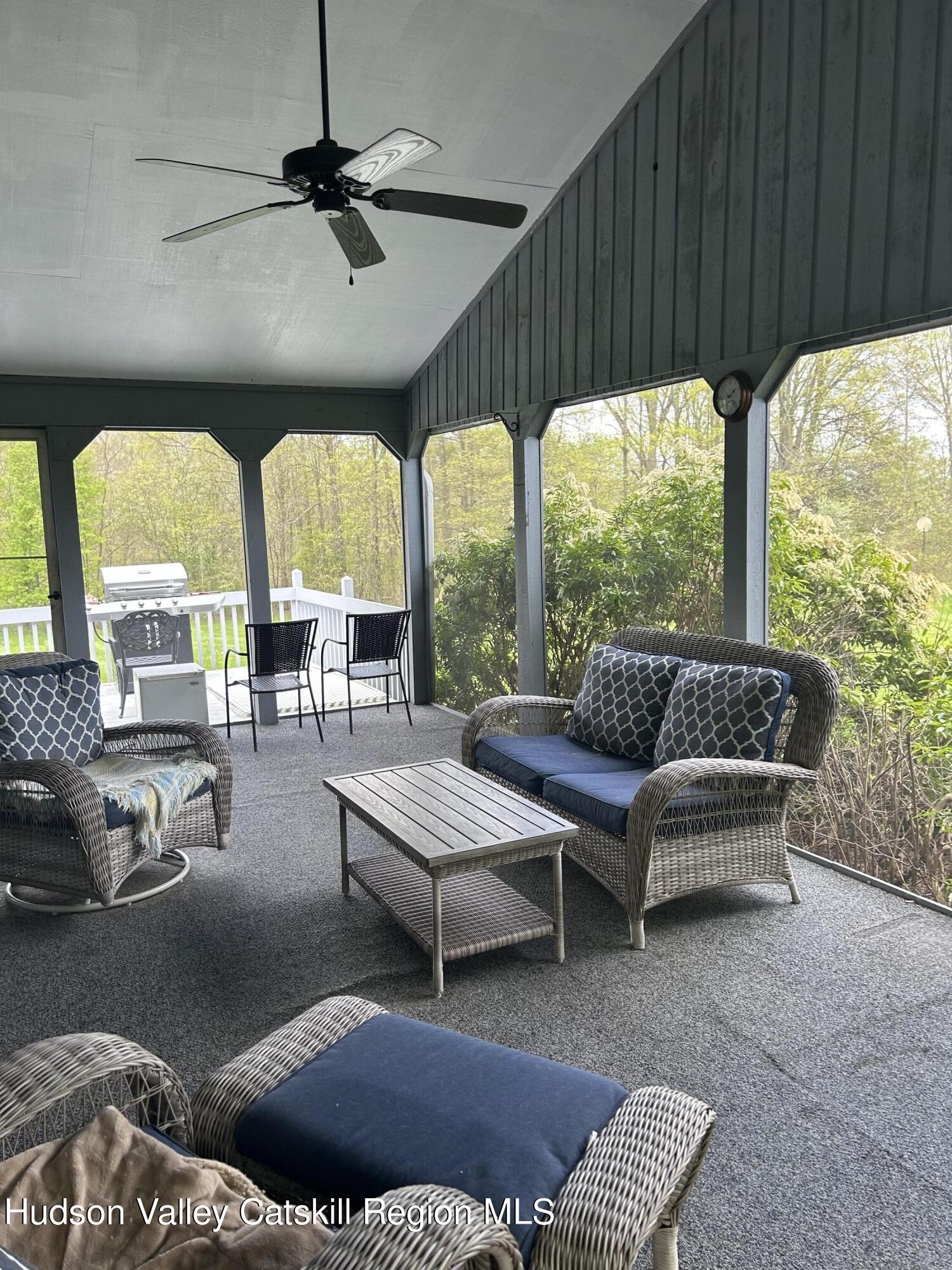 40 Tillson Lake Road Wallkill, NY 12589 - Photo 35 of 42 a living room with furniture and a large window