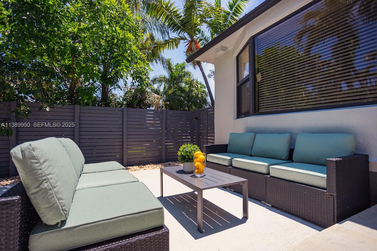 801 Harrison Street Hollywood, FL 33019 - Photo 11 of 46 a view of outdoor sitting area with furniture