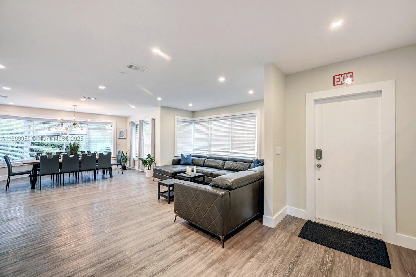 801 Harrison Street Hollywood, FL 33019 - Photo 15 of 46 a living room with furniture and wooden floor