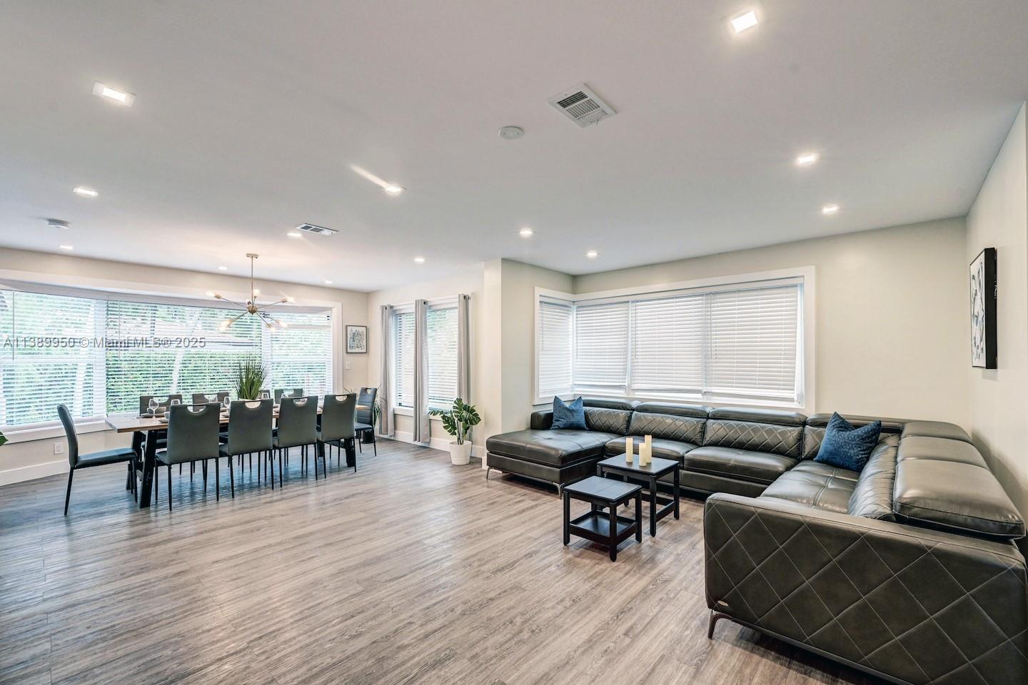 801 Harrison Street Hollywood, FL 33019 - Photo 17 of 46 a living room with lots of furniture and wooden floor