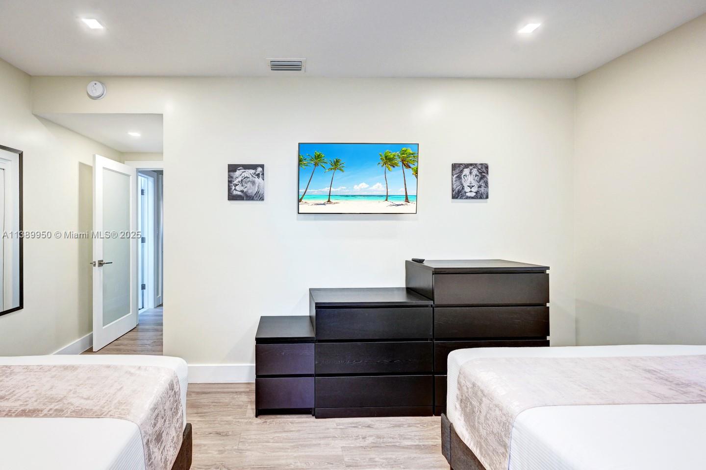 801 Harrison Street Hollywood, FL 33019 - Photo 31 of 46 a bedroom with a bed and furniture