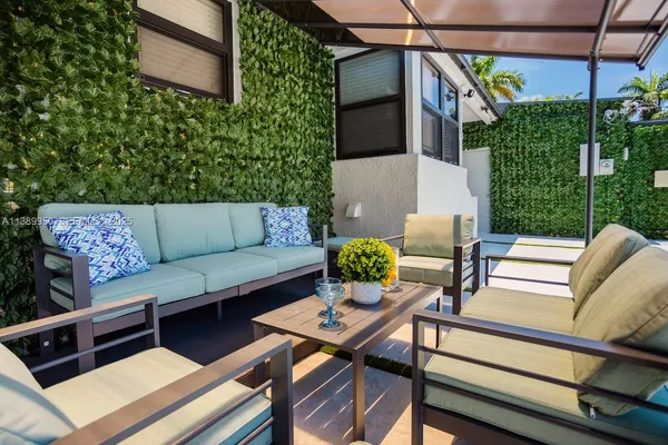 a outdoor living space with furniture