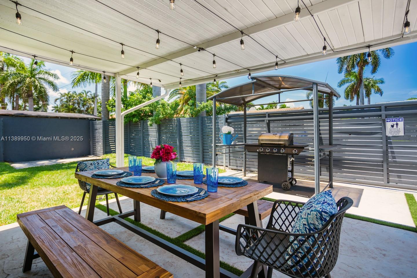 801 Harrison Street Hollywood, FL 33019 - Photo 10 of 46 a outdoor view with a sitting space