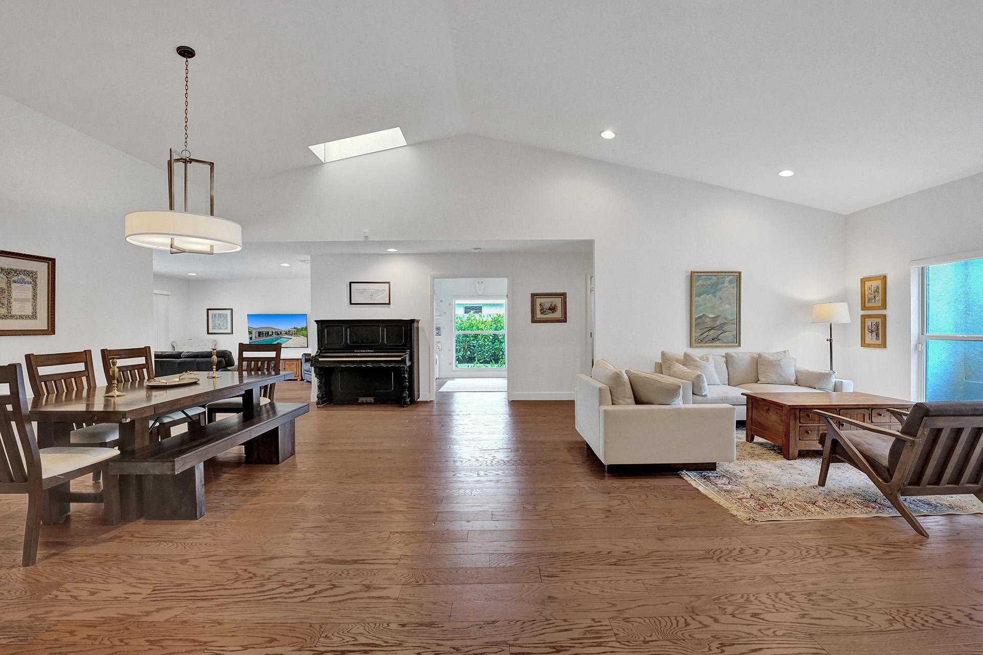 5264 Deerhurst Crescent Circle Boca Raton, FL 33486 - Photo 12 of 62 a living room with furniture flat screen tv and fireplace