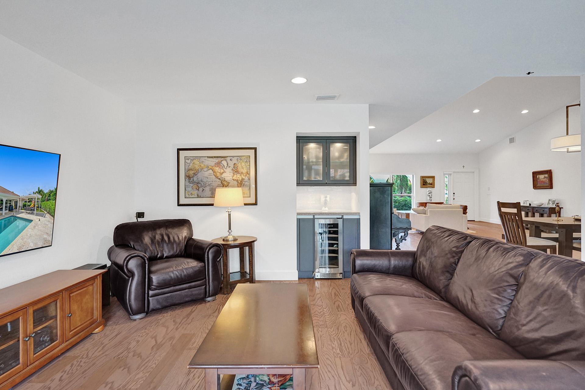 5264 Deerhurst Crescent Circle Boca Raton, FL 33486 - Photo 22 of 62 a living room with furniture and a fireplace