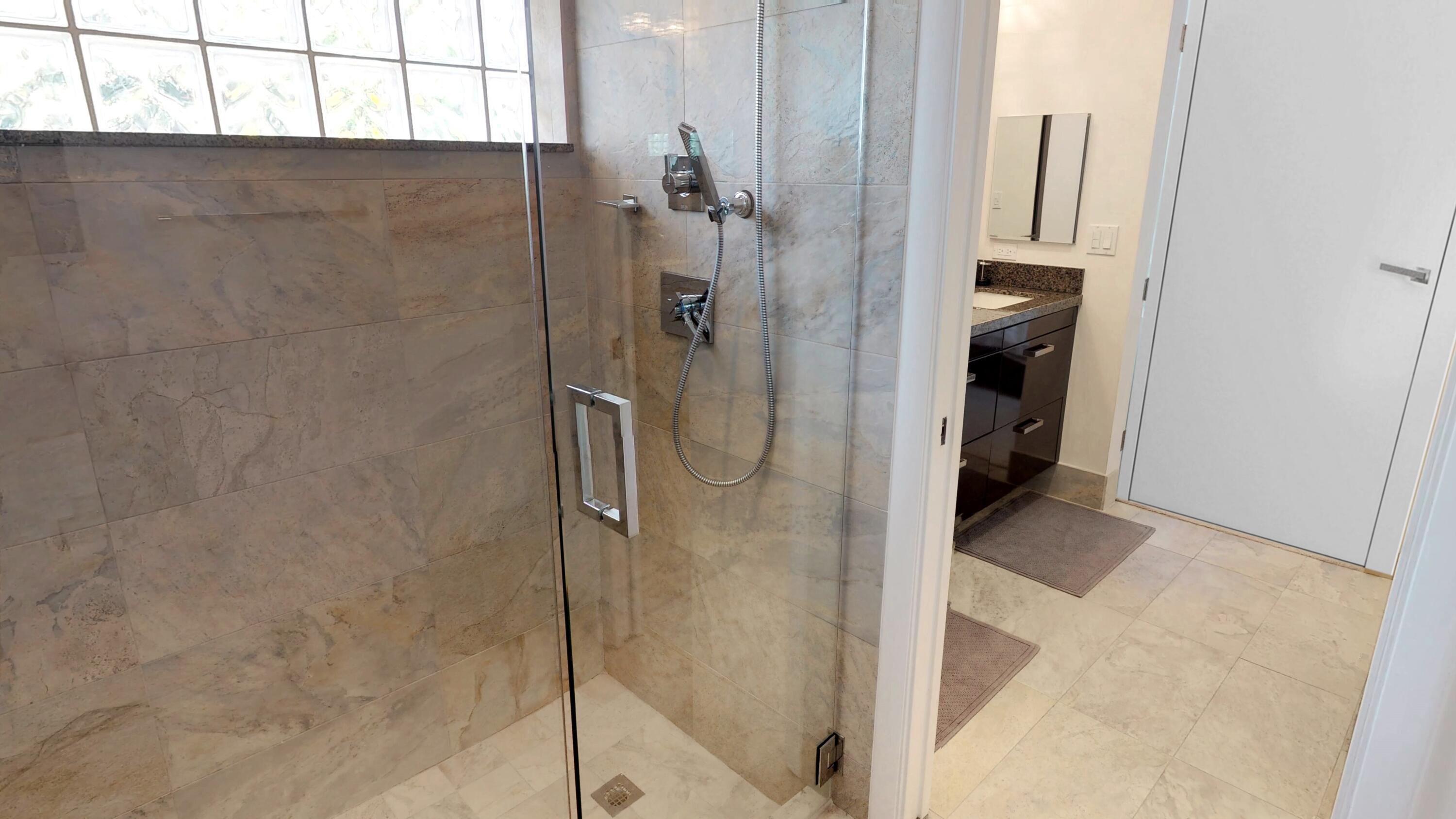 5264 Deerhurst Crescent Circle Boca Raton, FL 33486 - Photo 32 of 62 a bathroom with a shower