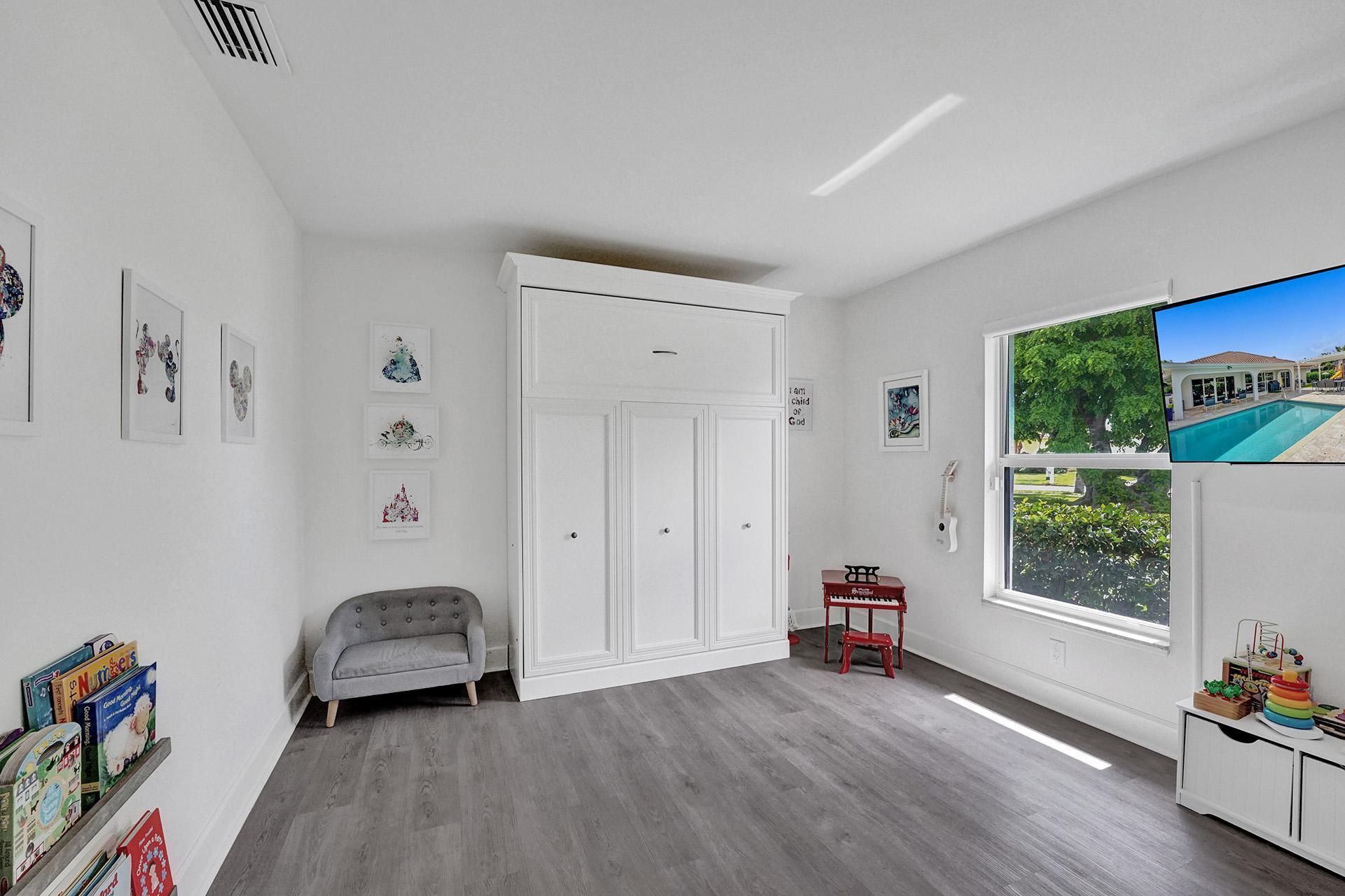 5264 Deerhurst Crescent Circle Boca Raton, FL 33486 - Photo 38 of 62 a view of room with furniture and a window