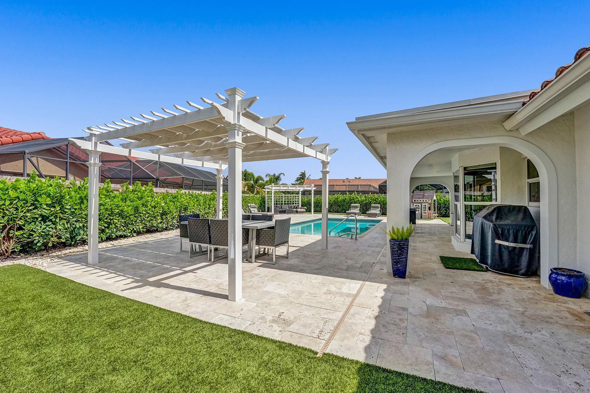 5264 Deerhurst Crescent Circle Boca Raton, FL 33486 - Photo 41 of 62 a view of a house with backyard and porch