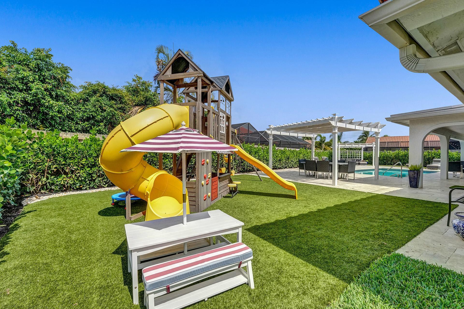 5264 Deerhurst Crescent Circle Boca Raton, FL 33486 - Photo 44 of 62 a view of a park with slide