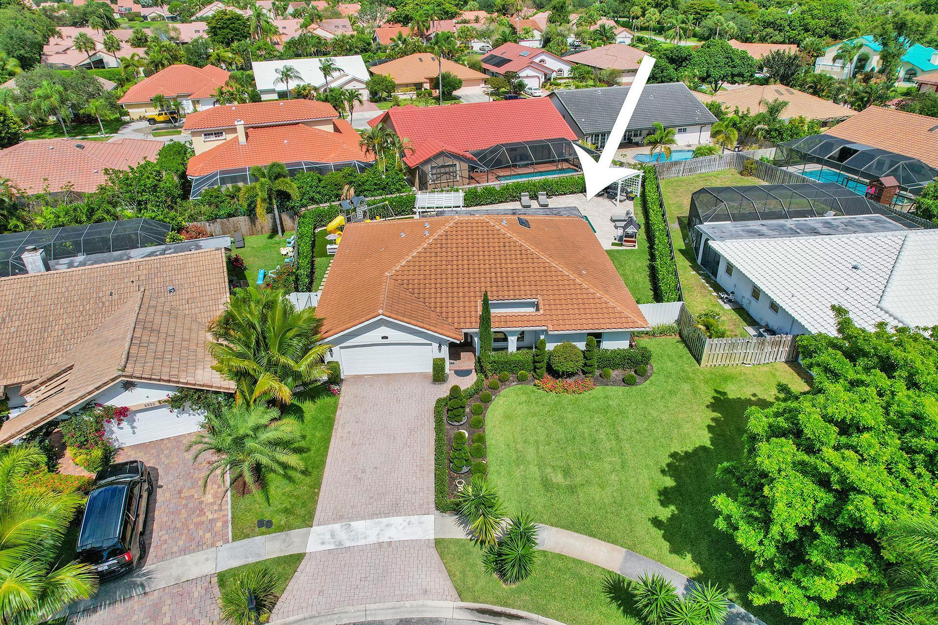 5264 Deerhurst Crescent Circle Boca Raton, FL 33486 - Photo 61 of 62 an aerial view of multiple houses with yard