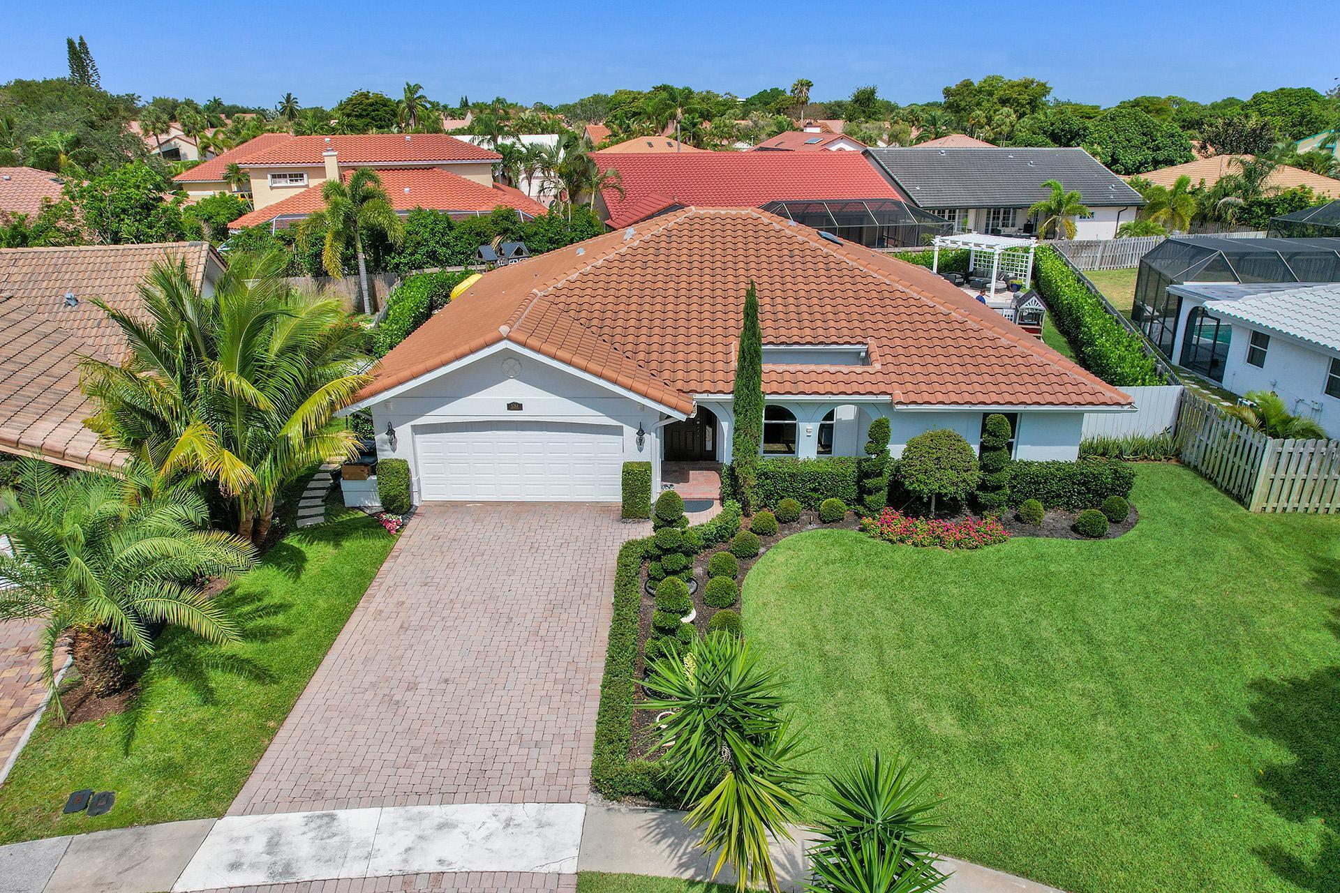 5264 Deerhurst Crescent Circle Boca Raton, FL 33486 - Photo 62 of 62 a aerial view of a house next to a yard