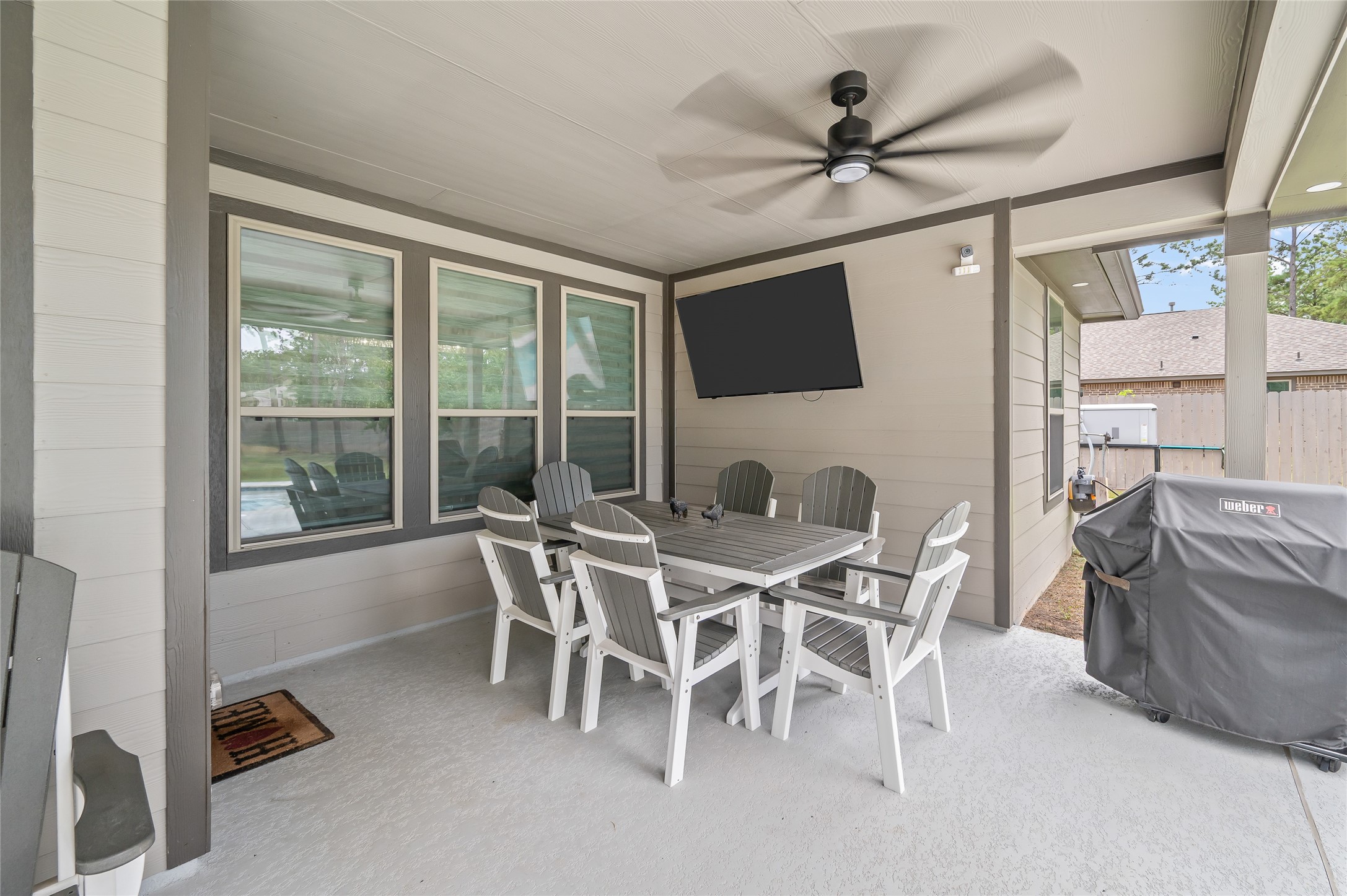 13419 Maverick Trail Road Conroe, TX 77303 - Photo 32 of 49 Covered patio with one of two ceiling fans, with access to the breakfast room.