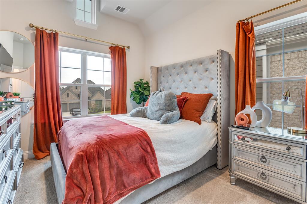 2417 Shane Drive Midlothian, TX 76065 - Photo 26 of 40 a bedroom with a bed and large window