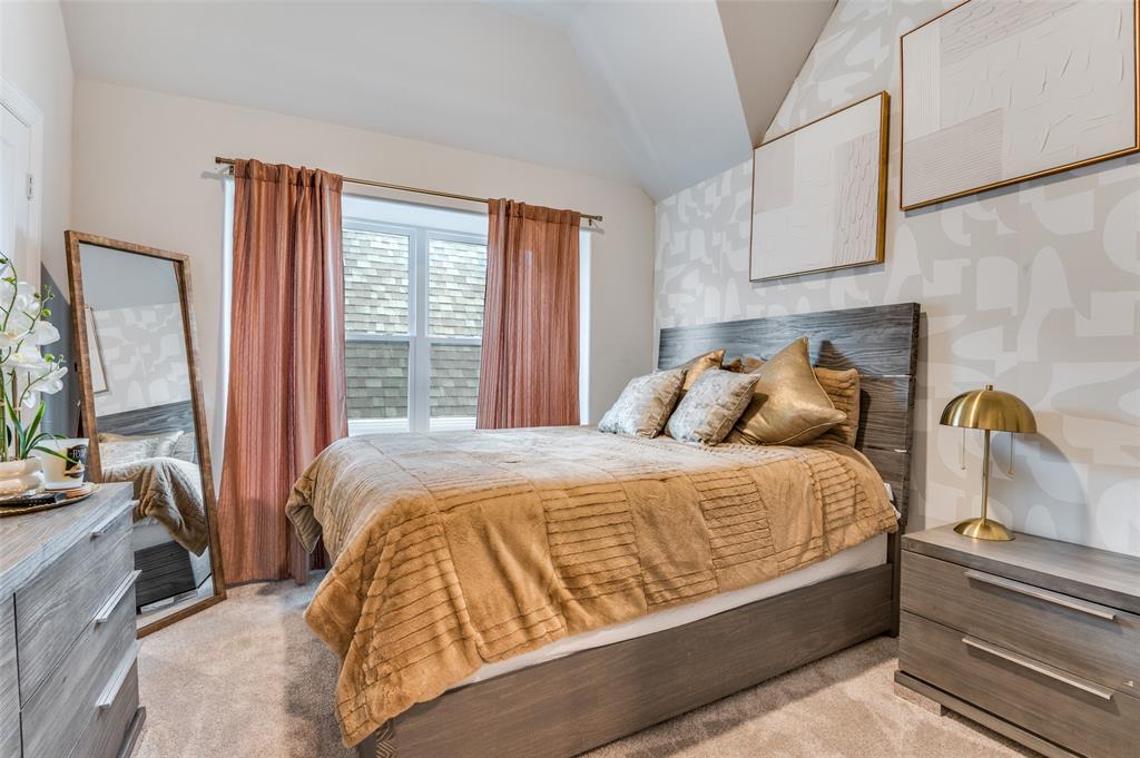 2417 Shane Drive Midlothian, TX 76065 - Photo 27 of 40 a bed sitting in a bedroom next to a window