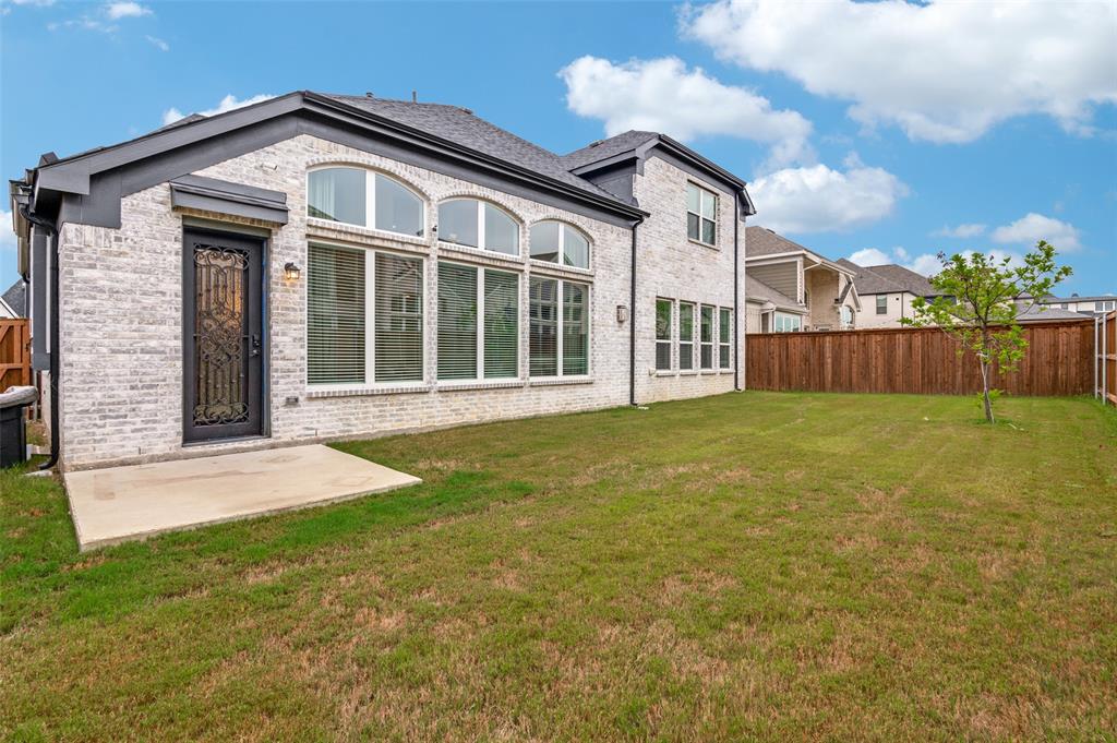 2417 Shane Drive Midlothian, TX 76065 - Photo 34 of 40 a front view of a house with a yard